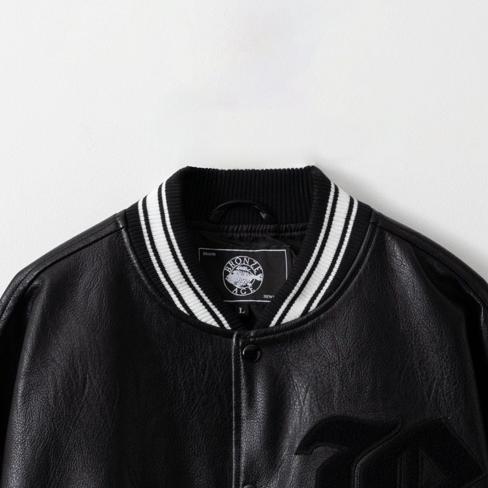 BRONZE AGE Bロゴサガラスタジアムジャケット メンズ