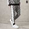 [期間限定価格]【オンラインストア限定】GIANNI VALENTINO ポンチ素材 総柄ジョガーパンツ メンズ商品サムネイル-1