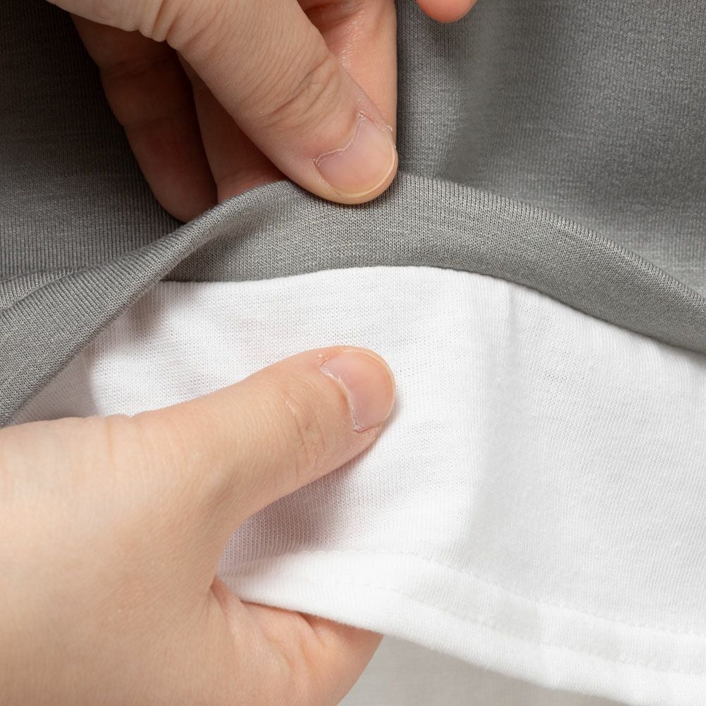 URBAN COLLECTION エアスムージー ポンチ素材 フェイクレイヤードプルオーバー レディース