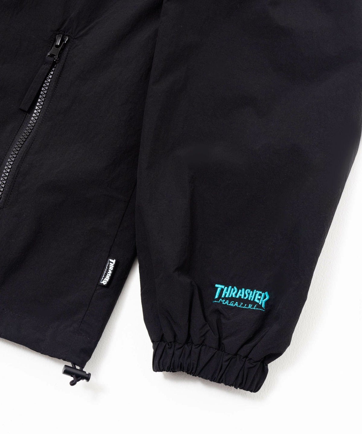 THRASHER 総柄裏地付きナイロンジャケット メンズ