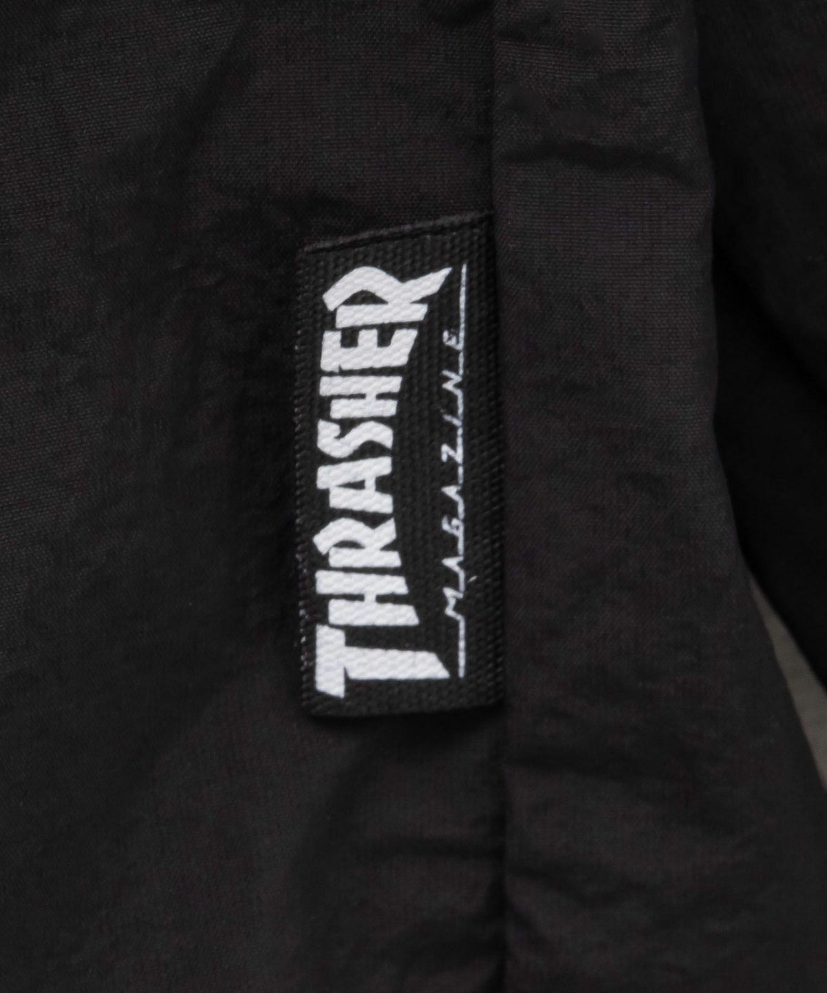 THRASHER 総柄裏地付きナイロンジャケット メンズ