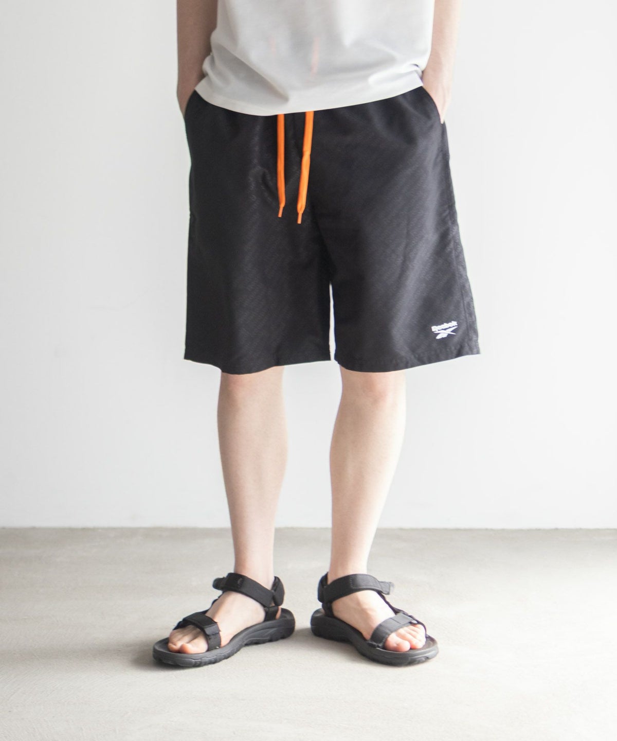 Reebok エンボスサーフショートパンツ メンズ