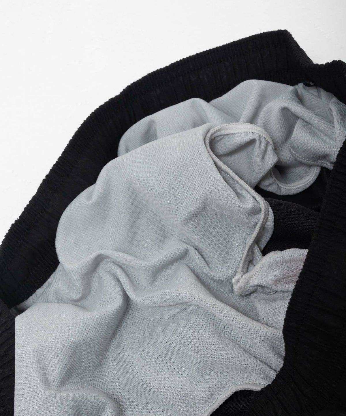 Reebok エンボスサーフショートパンツ メンズ