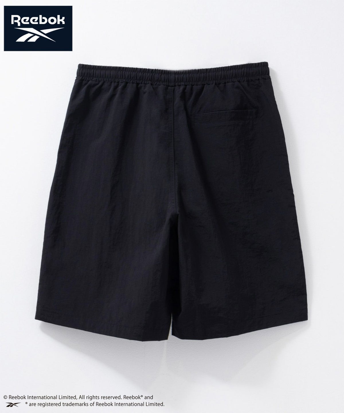 Reebok ナイロンパイピングショートパンツ メンズ