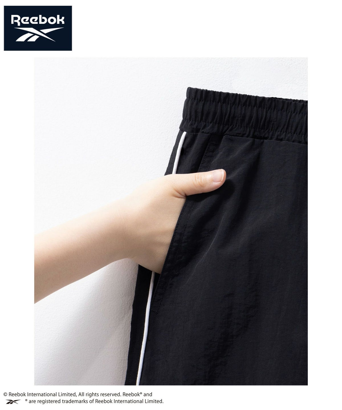 Reebok ナイロンパイピングショートパンツ メンズ
