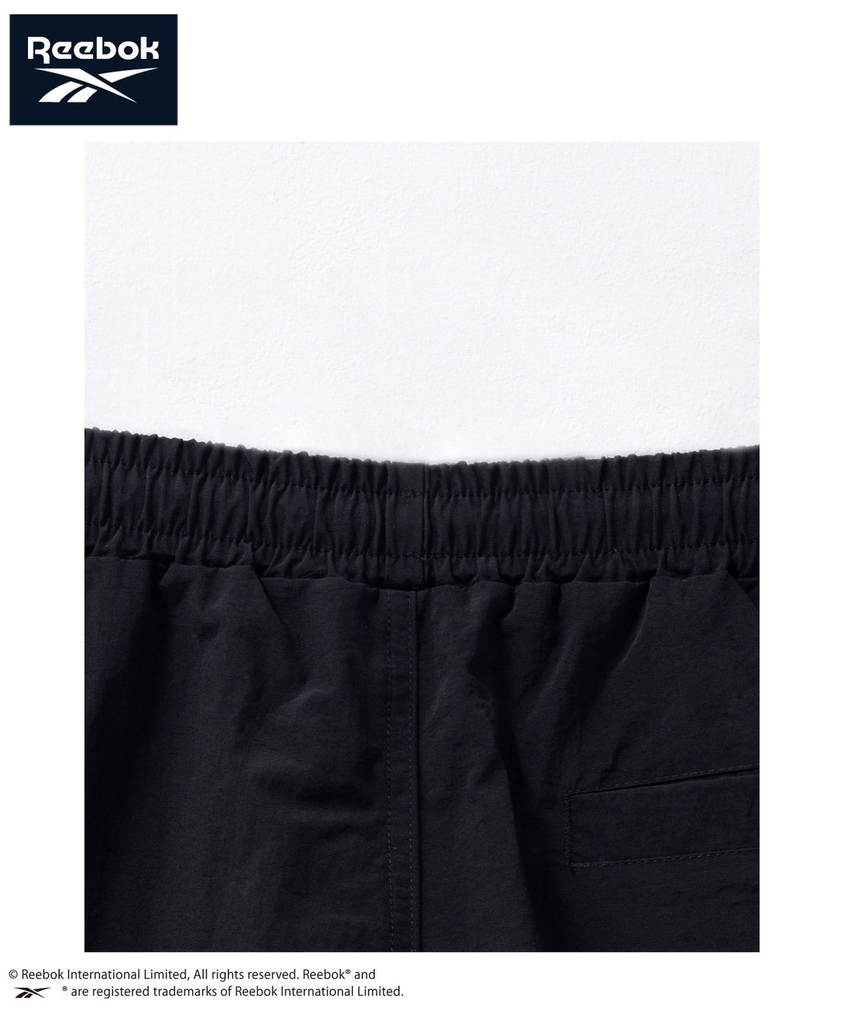 Reebok ナイロンパイピングショートパンツ メンズ
