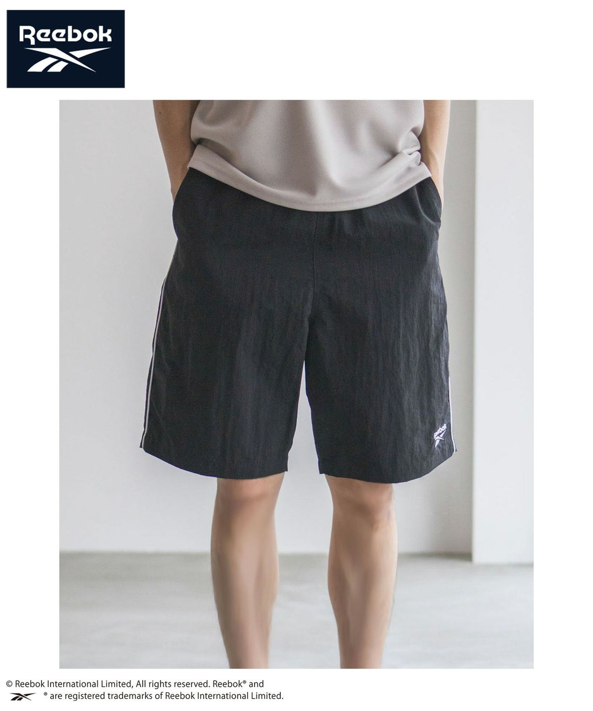 Reebok ナイロンパイピングショートパンツ メンズ