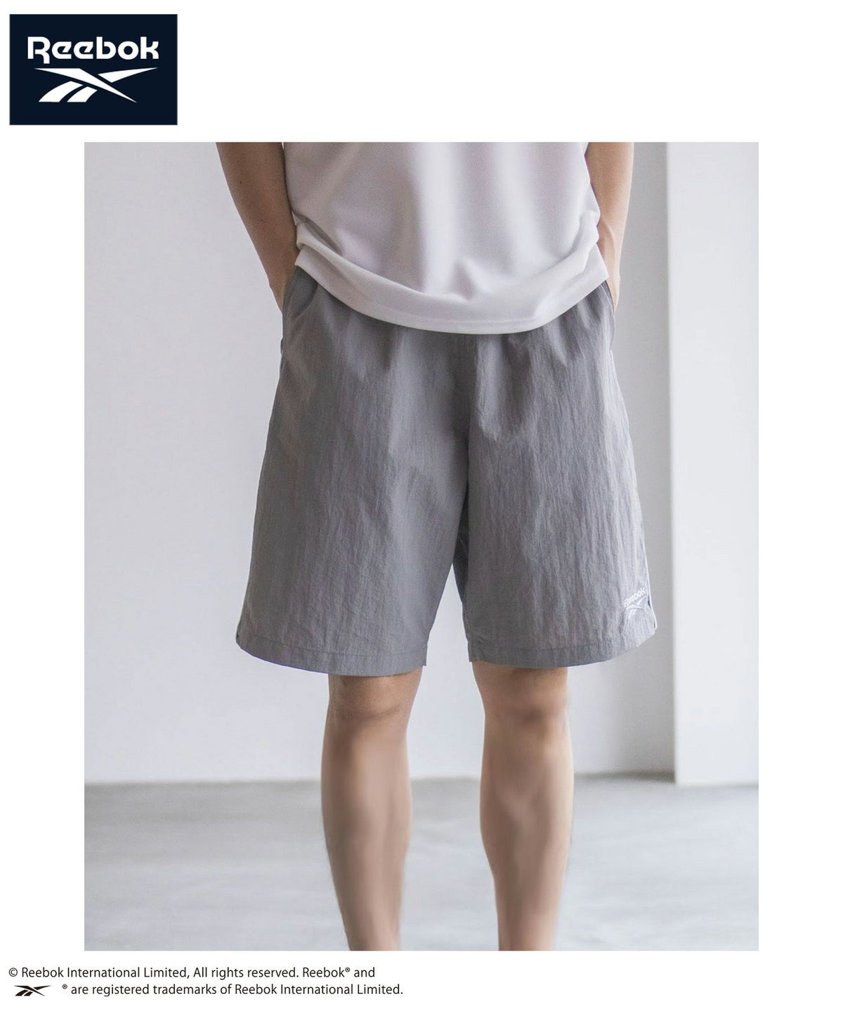 Reebok ナイロンパイピングショートパンツ メンズ