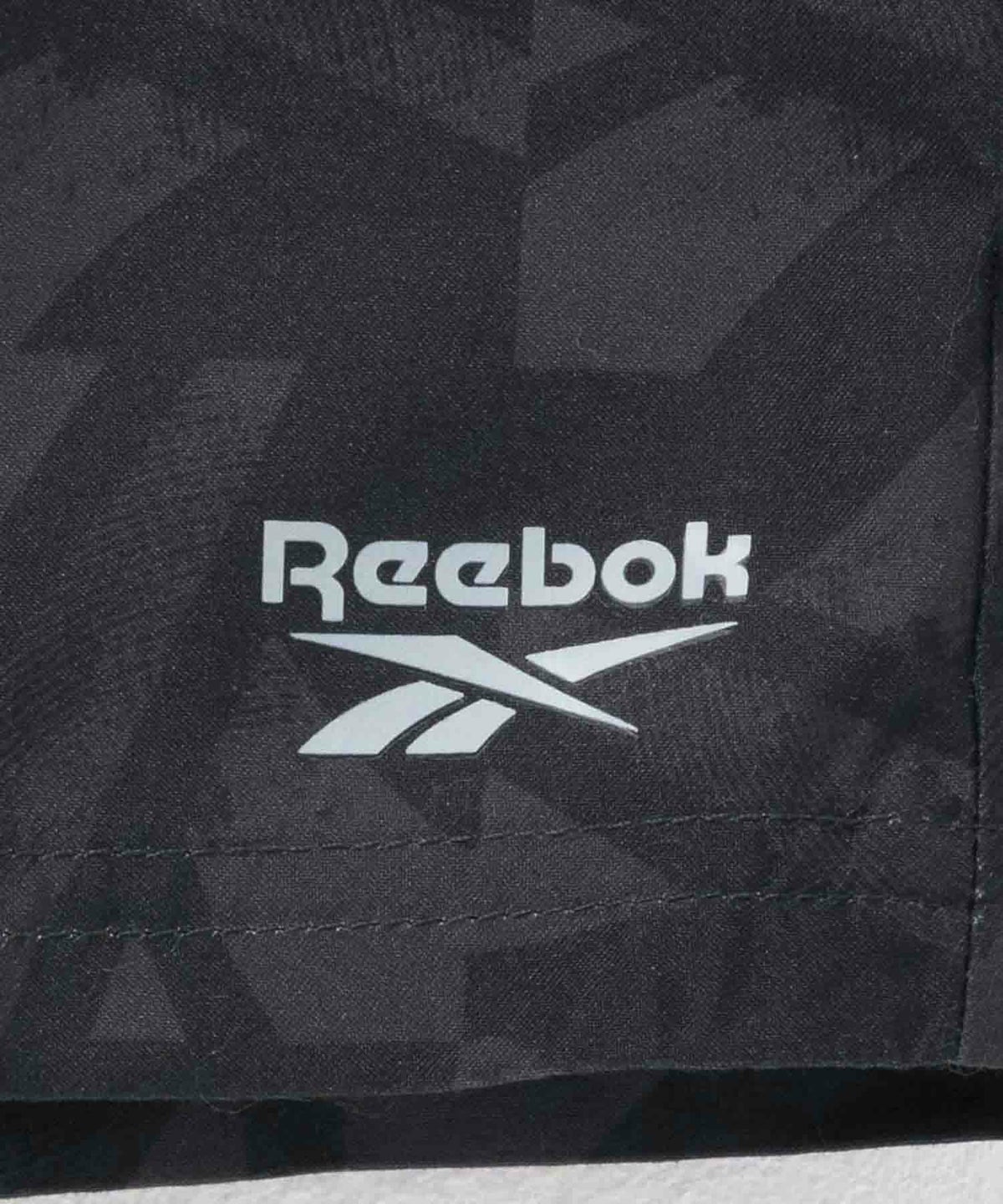 Reebok 総柄サーフトランクス ショートパンツ メンズ