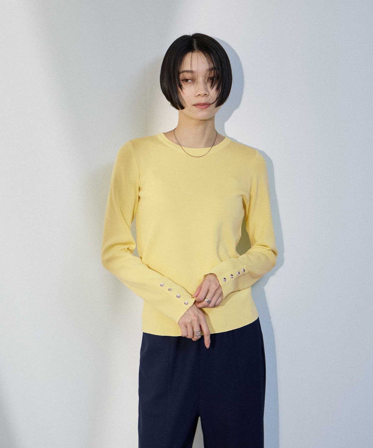 milli de l'air 袖口ボタンリブニットプルオーバー レディース