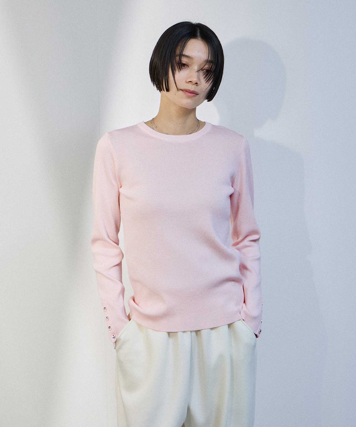 milli de l'air 袖口ボタンリブニットプルオーバー レディース